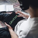 A Person Holding a Digital Tablet